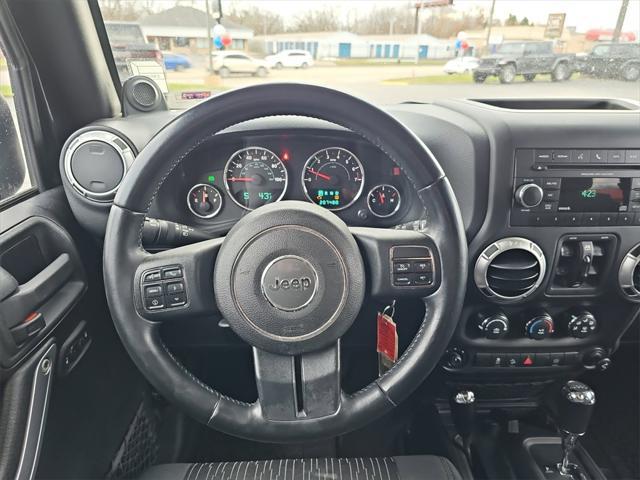 used 2012 Jeep Wrangler Unlimited car, priced at $11,956