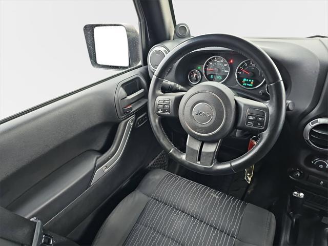 used 2012 Jeep Wrangler Unlimited car, priced at $11,956