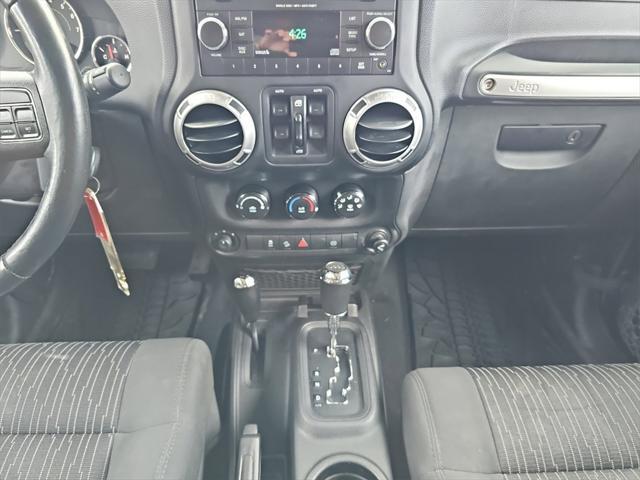 used 2012 Jeep Wrangler Unlimited car, priced at $11,956