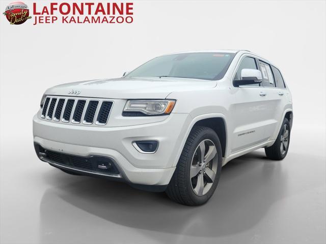 used 2014 Jeep Grand Cherokee car, priced at $13,058