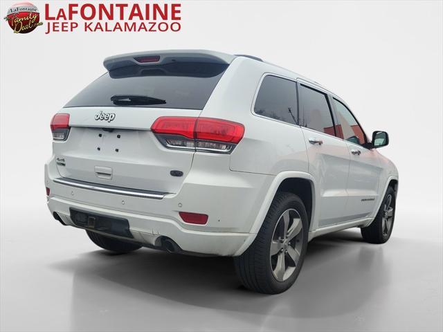 used 2014 Jeep Grand Cherokee car, priced at $13,058