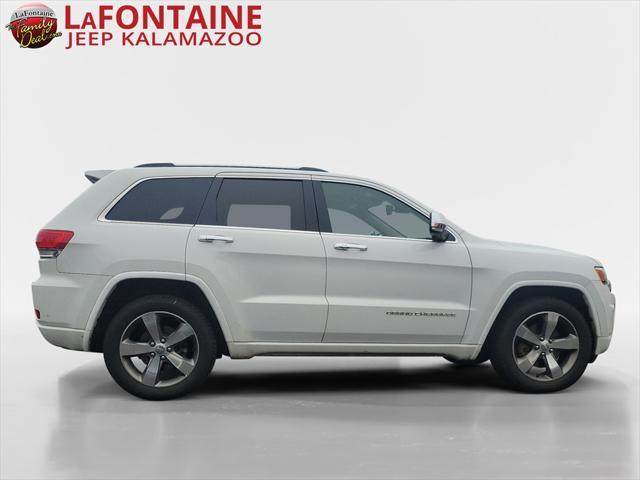 used 2014 Jeep Grand Cherokee car, priced at $13,058