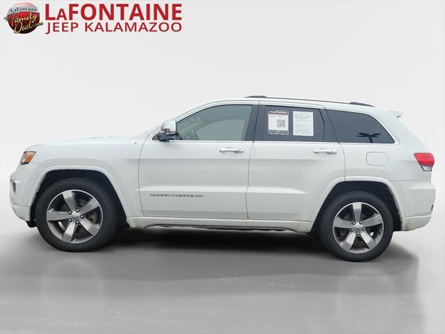 used 2014 Jeep Grand Cherokee car, priced at $13,058