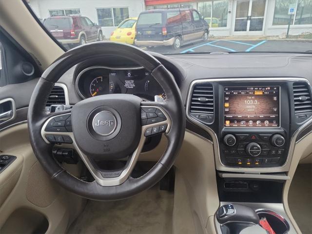 used 2014 Jeep Grand Cherokee car, priced at $13,058