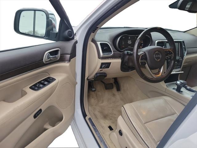 used 2014 Jeep Grand Cherokee car, priced at $13,058