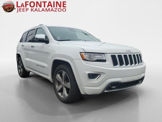 used 2014 Jeep Grand Cherokee car, priced at $13,058