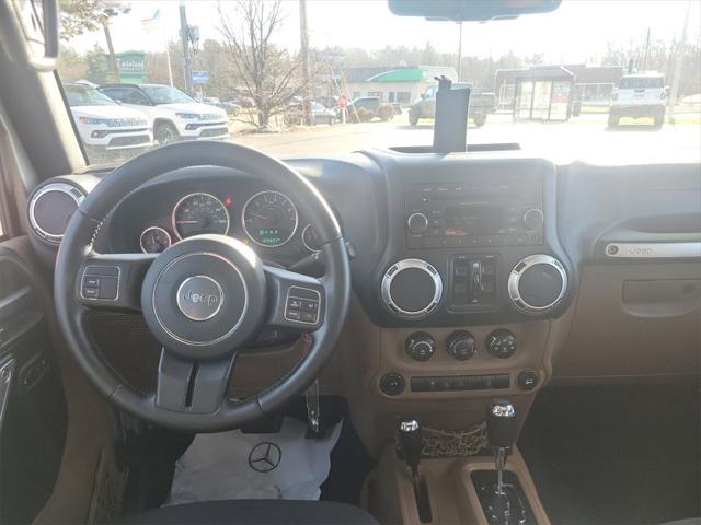 used 2016 Jeep Wrangler Unlimited car, priced at $12,500