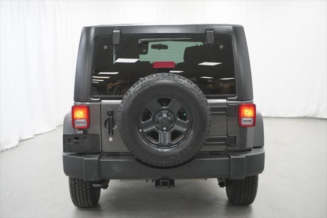 used 2018 Jeep Wrangler JK Unlimited car, priced at $23,194