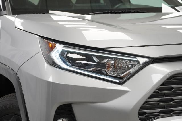 used 2020 Toyota RAV4 Hybrid car, priced at $29,394