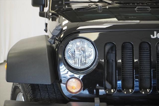 used 2018 Jeep Wrangler JK Unlimited car, priced at $26,494