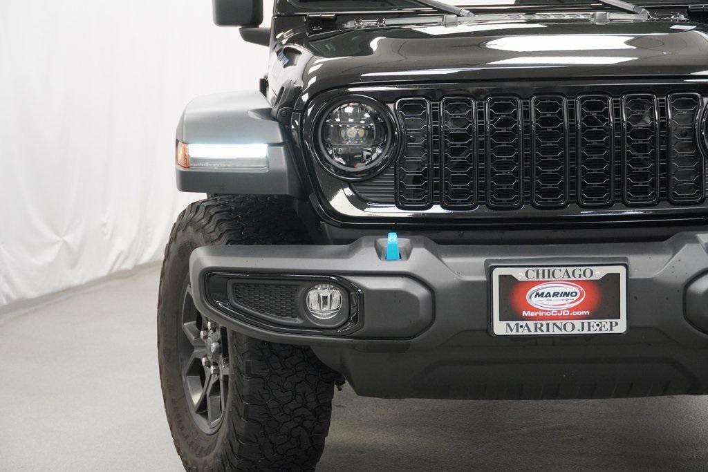 used 2024 Jeep Wrangler car, priced at $38,294