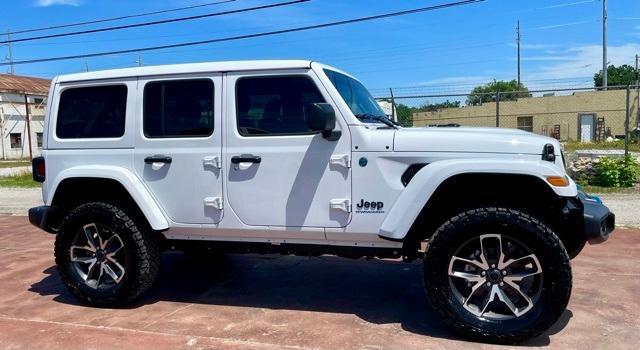 new 2024 Jeep Wrangler 4xe car, priced at $44,873