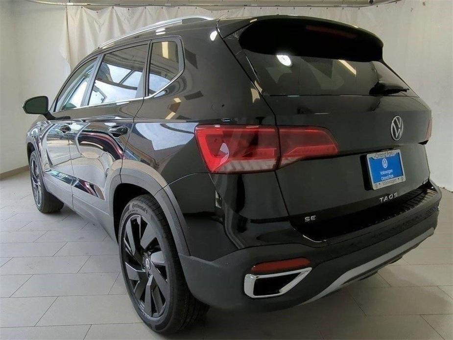 used 2024 Volkswagen Taos car, priced at $26,494