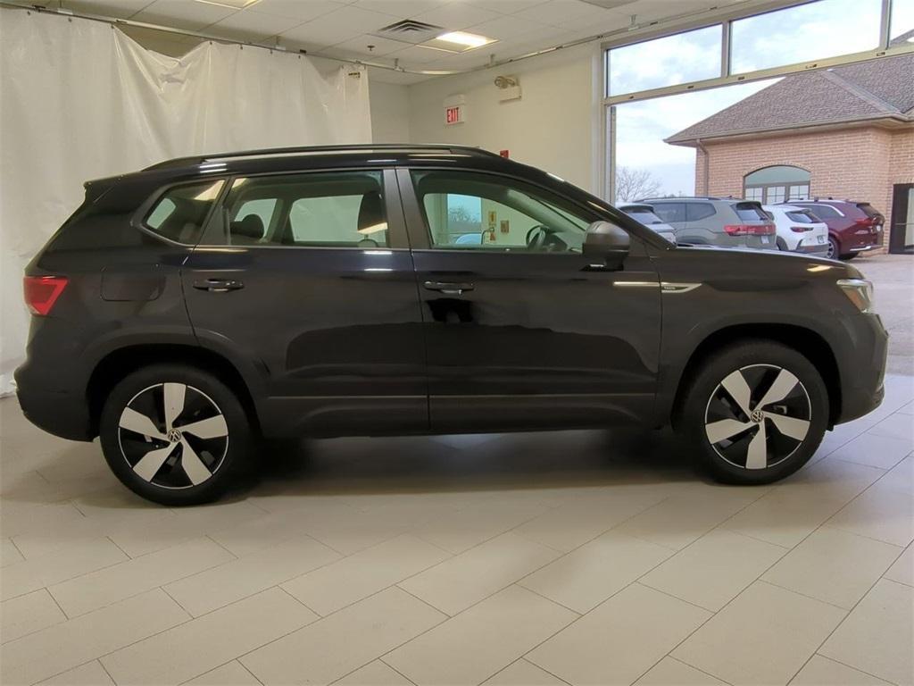 used 2023 Volkswagen Taos car, priced at $19,497