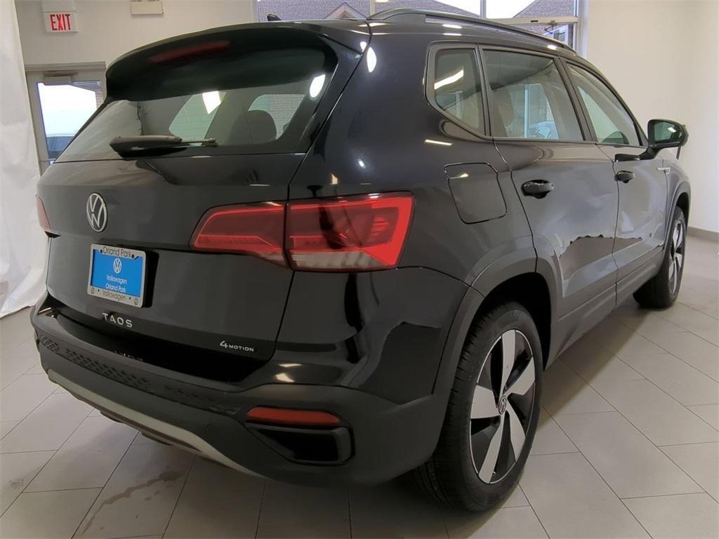 used 2023 Volkswagen Taos car, priced at $19,497