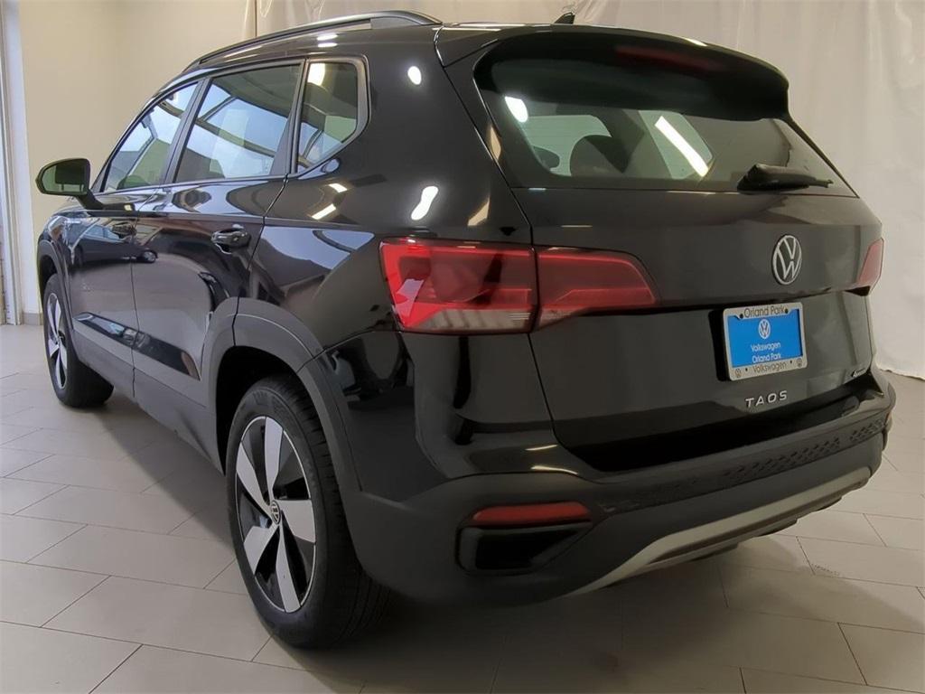 used 2023 Volkswagen Taos car, priced at $19,497