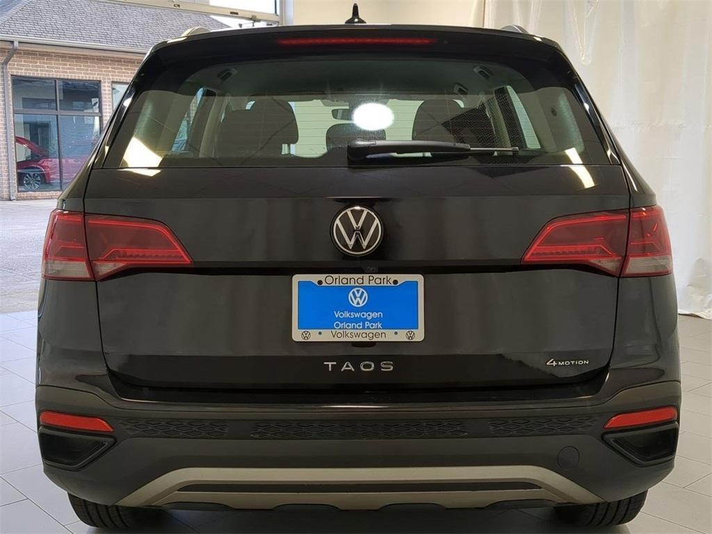 used 2023 Volkswagen Taos car, priced at $19,497