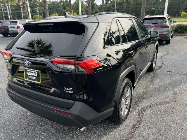 used 2024 Toyota RAV4 Hybrid car, priced at $32,678