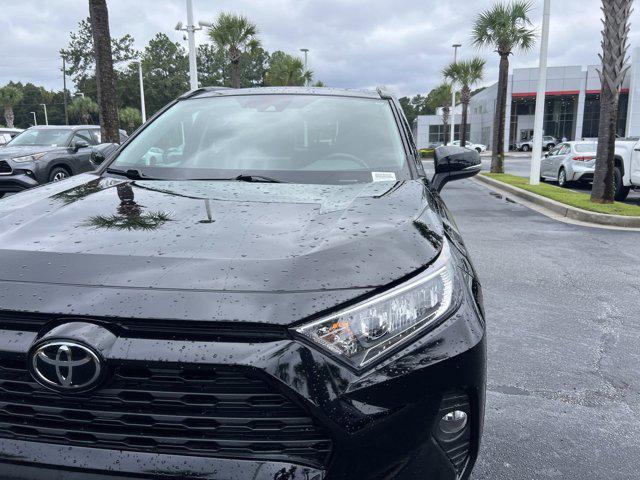 used 2021 Toyota RAV4 car, priced at $28,998