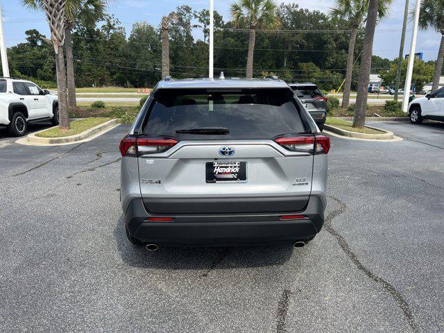 used 2024 Toyota RAV4 Hybrid car, priced at $32,998