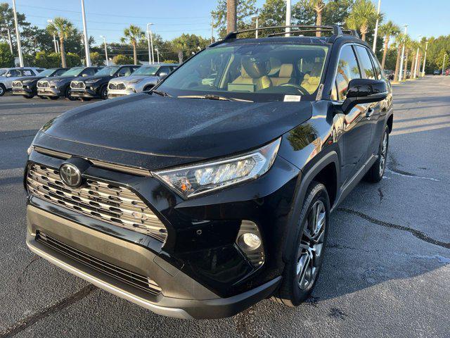 used 2019 Toyota RAV4 car, priced at $28,678