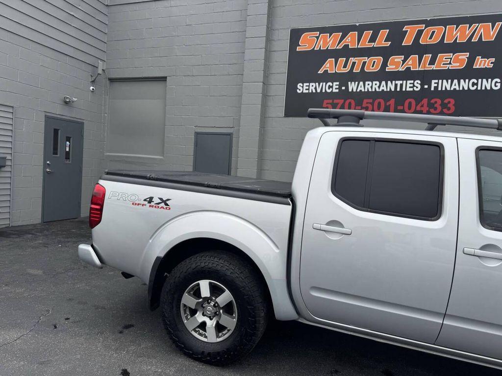 used 2011 Nissan Frontier car, priced at $14,999