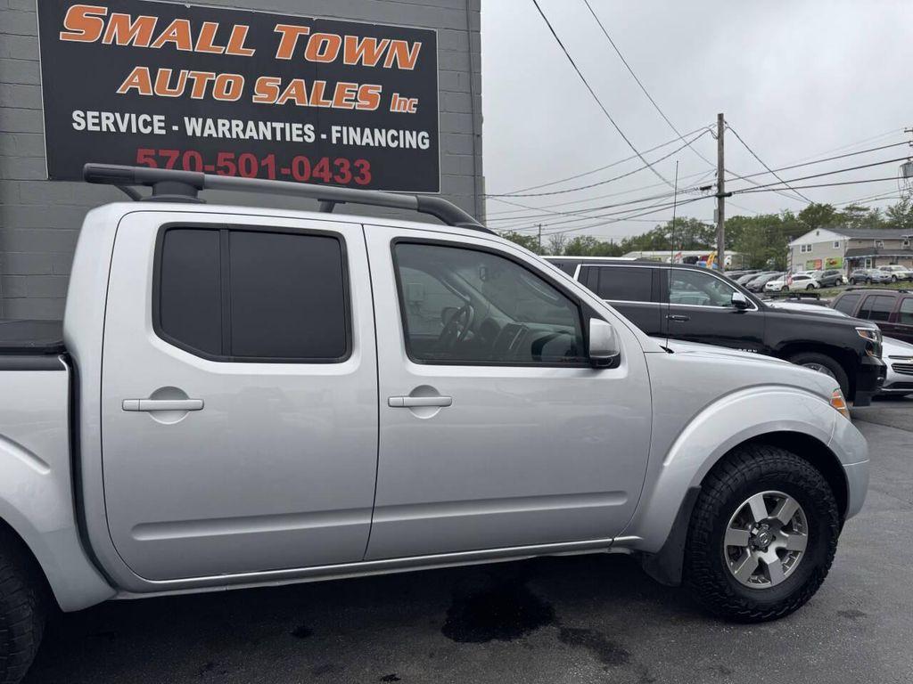 used 2011 Nissan Frontier car, priced at $14,999