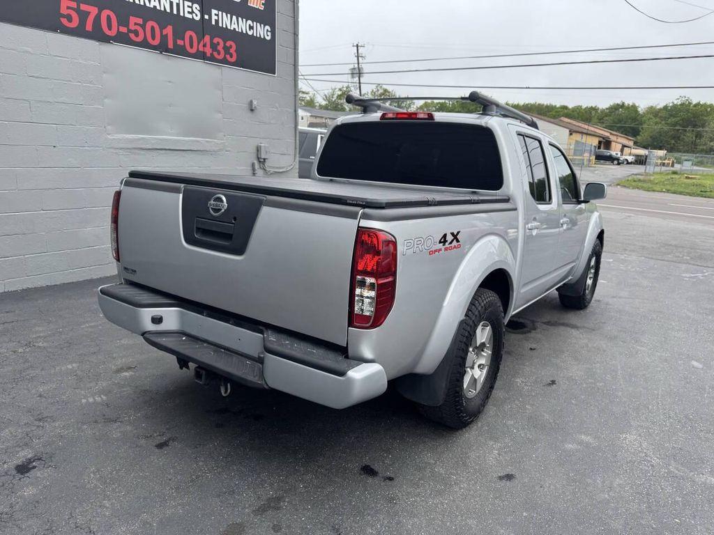 used 2011 Nissan Frontier car, priced at $14,999