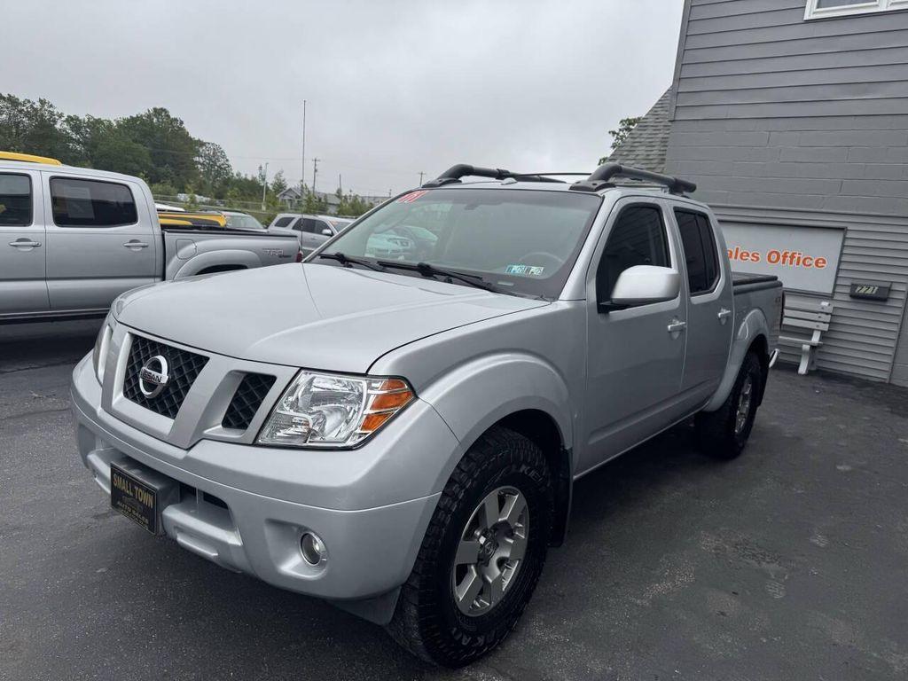used 2011 Nissan Frontier car, priced at $14,999