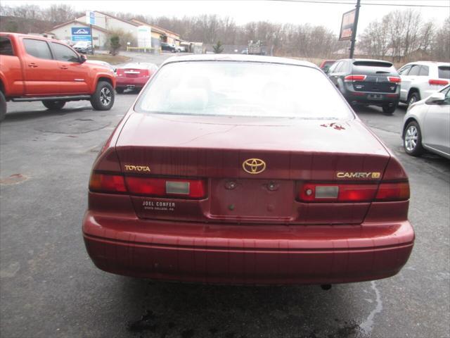 used 1999 Toyota Camry car, priced at $4,999