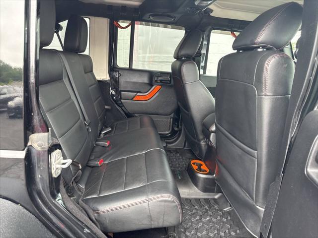 used 2012 Jeep Wrangler Unlimited car, priced at $13,999