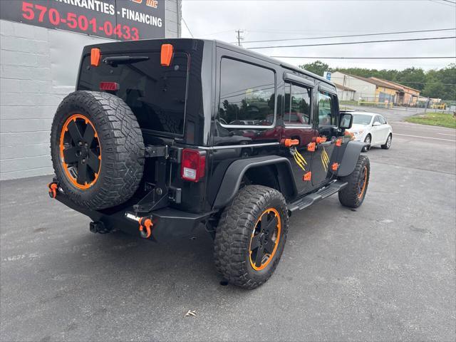 used 2012 Jeep Wrangler Unlimited car, priced at $13,999