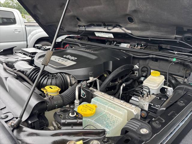 used 2012 Jeep Wrangler Unlimited car, priced at $13,999