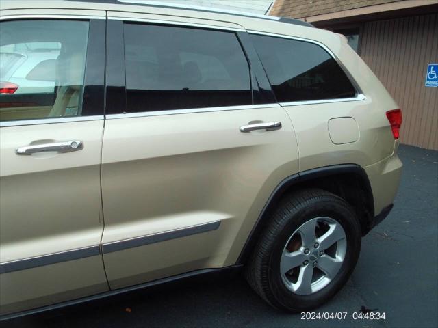 used 2011 Jeep Grand Cherokee car, priced at $9,999