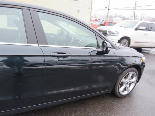 used 2014 Ford Fusion car, priced at $10,499