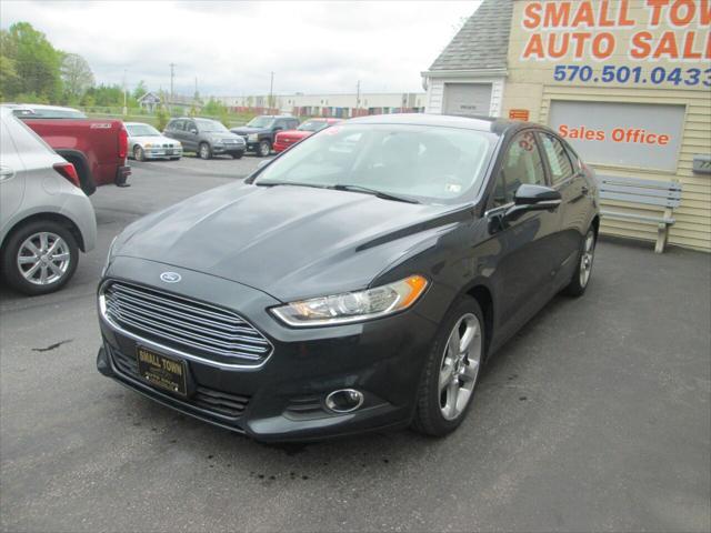 used 2014 Ford Fusion car, priced at $10,499