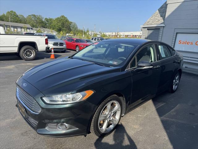 used 2014 Ford Fusion car, priced at $9,999