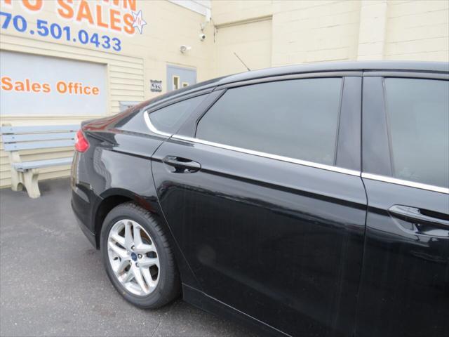 used 2016 Ford Fusion car, priced at $10,499