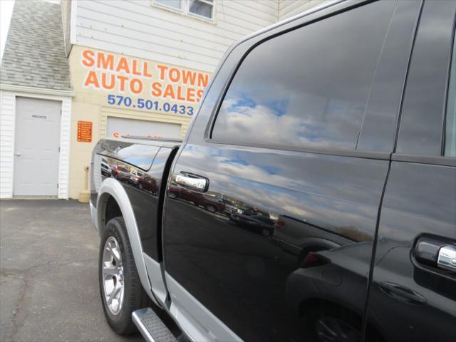 used 2015 Ram 1500 car, priced at $19,699