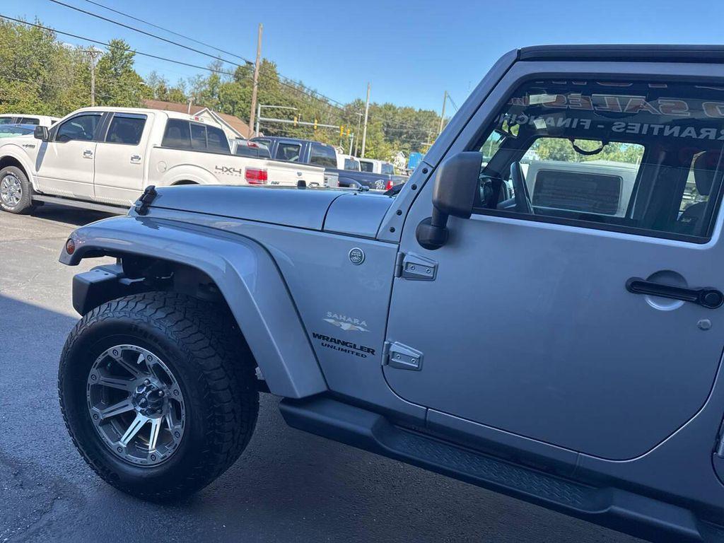 used 2014 Jeep Wrangler Unlimited car, priced at $18,999