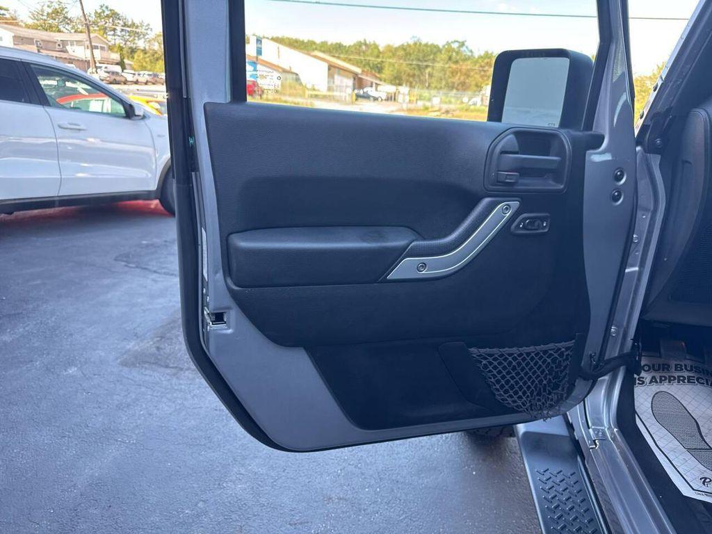 used 2014 Jeep Wrangler Unlimited car, priced at $18,999