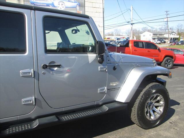 used 2014 Jeep Wrangler Unlimited car, priced at $19,999