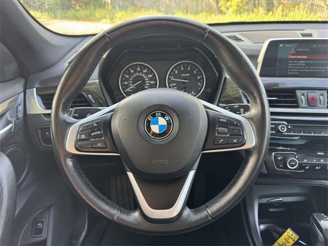 used 2018 BMW X1 car, priced at $9,701