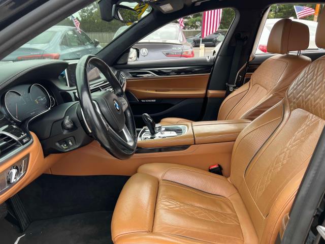 used 2016 BMW 750 car, priced at $16,306