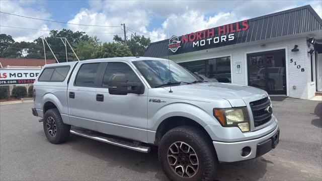 used 2014 Ford F-150 car, priced at $13,499