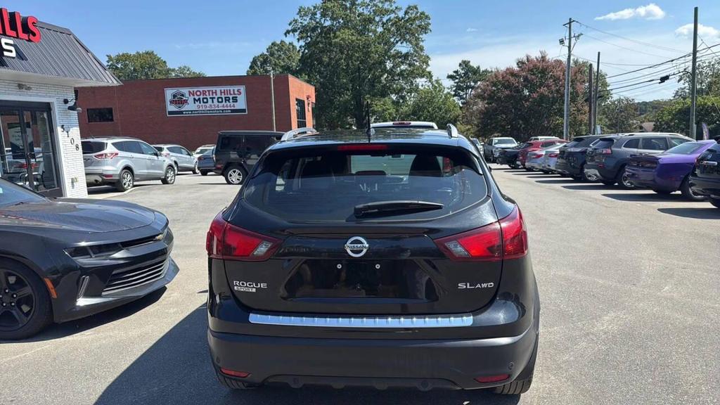 used 2019 Nissan Rogue Sport car, priced at $9,999