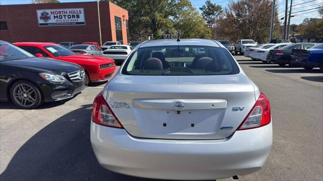 used 2012 Nissan Versa car, priced at $5,999