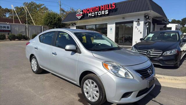 used 2012 Nissan Versa car, priced at $5,999