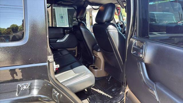 used 2014 Jeep Wrangler Unlimited car, priced at $23,999