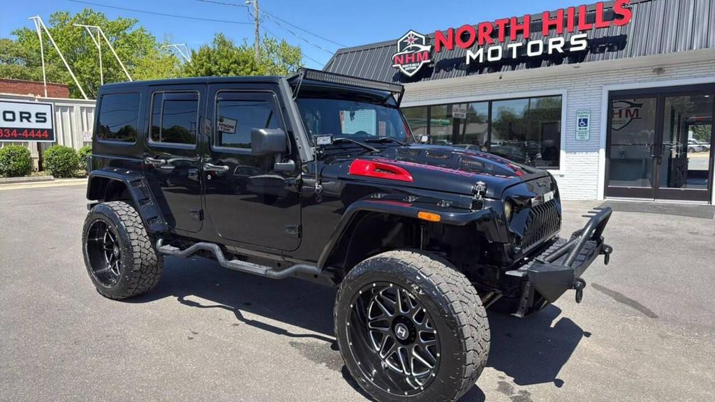used 2014 Jeep Wrangler Unlimited car, priced at $18,499